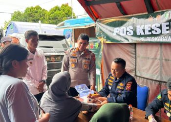 Kabid Humas Polda Jabar Tinjau Posko Kesehatan Biddokkes di Lokasi Banjir Karangligar